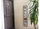 Inviting front entrance with a 'Welcome' sign and a decorative plant, providing a warm and welcoming atmosphere at 120 1St E St # 104, St Petersburg, FL 33715