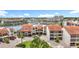 Attractive condo complex with garages, lush landscaping, and waterfront views offer desirable living at 120 1St E St # 104, St Petersburg, FL 33715