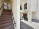 Exterior view of staircase and garage for unit 104 at 120 1St E St # 104, St Petersburg, FL 33715
