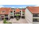 Charming condo building with covered parking, manicured landscaping and well maintained facade at 120 1St E St # 104, St Petersburg, FL 33715
