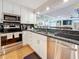 Kitchen featuring stainless steel appliances and granite countertops at 120 1St E St # 104, St Petersburg, FL 33715