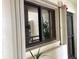 Enclosed patio with sliding glass windows and a screen door at 120 1St E St # 104, St Petersburg, FL 33715