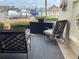 Outdoor patio area with comfortable seating overlooking the marina at 120 1St E St # 104, St Petersburg, FL 33715