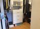 Organized walk-in closet with shelving and drawers, maximizing storage space with hanging clothes at 120 1St E St # 104, St Petersburg, FL 33715