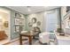 Cozy home office with a desk, chair, and natural light at 1759 Longliner Loop, Wesley Chapel, FL 33543
