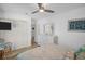 Comfortable bedroom with ceiling fan and ample storage provides a peaceful retreat at 1769 Brookside Blvd, Largo, FL 33770