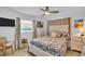 Relaxing bedroom with a bright window and plush bedding, making it an ideal retreat at 1769 Brookside Blvd, Largo, FL 33770