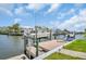 Private boat dock and lift with direct access to the water, ideal for boating enthusiasts and waterfront activities at 1769 Brookside Blvd, Largo, FL 33770
