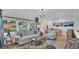 Comfortable living room with cozy seating, natural light, and stylish accents, perfect for relaxing and entertaining guests at 1769 Brookside Blvd, Largo, FL 33770