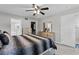 Bedroom with ensuite bath, walk-in closet and neutral paint at 1948 Grenville Ct, Wesley Chapel, FL 33543