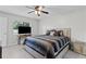Comfortable bedroom with large window and modern decor at 1948 Grenville Ct, Wesley Chapel, FL 33543