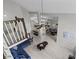 Open-concept living room with modern furnishings and natural light at 1948 Grenville Ct, Wesley Chapel, FL 33543