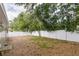 A spacious, fenced backyard offering privacy and potential for outdoor activities at 2012 Scotland Dr, Clearwater, FL 33763