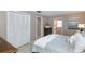 Cozy bedroom with a large closet, ensuite bathroom, and neutral color scheme at 2012 Scotland Dr, Clearwater, FL 33763