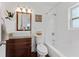 Bathroom with vessel sink on granite countertop, and shower over tub with white tiling at 2306 Trelain S Dr, St Petersburg, FL 33712