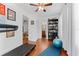 View of the exercise room featuring exercise ball, treadmill and hardwood floors at 2306 Trelain S Dr, St Petersburg, FL 33712