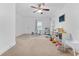 Bright ' playroom with neutral carpet and ceiling fan at 2306 Trelain S Dr, St Petersburg, FL 33712