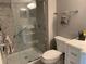 Updated bathroom with walk-in shower, gray tones, and vanity at 2720 Sand Hollow Ct # 156A, Clearwater, FL 33761