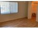 Bright bedroom with wood floors, window, and walk-in closet at 2720 Sand Hollow Ct # 156A, Clearwater, FL 33761