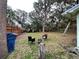 Cozy backyard setting with seating, a wooden fence, and lush greenery for relaxation at 2900 Dr Martin Luther King Jr S St, St Petersburg, FL 33705