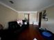 Cozy living room featuring hardwood floors, and a view into the adjacent rooms at 2900 Dr Martin Luther King Jr S St, St Petersburg, FL 33705
