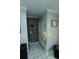 Stylish entryway with decorative hats and a welcoming, well-lit space at 300 6Th N St # E3, Safety Harbor, FL 34695