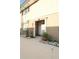 Inviting condo entrance features potted plants and a well-lit doorway at 300 6Th N St # E3, Safety Harbor, FL 34695