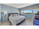 Serene bedroom featuring water views and a comfortable bed, creating a relaxing atmosphere at 31 Island Way # 1403, Clearwater Beach, FL 33767