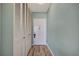 Hallway with a large storage closet provides ample space for coats and other items at 31 Island Way # 1403, Clearwater Beach, FL 33767