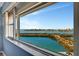 Breathtaking water view from a large window with the city skyline visible in the distance at 31 Island Way # 1403, Clearwater Beach, FL 33767