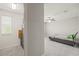 Bright bedroom with large closet features plush carpet and a ceiling fan at 3212 Calvano Dr, Land O Lakes, FL 34639