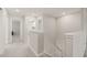 Bright hallway with neutral carpet leading to other rooms in the home at 3212 Calvano Dr, Land O Lakes, FL 34639