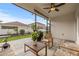 Comfortable screened patio with ceiling fan and stylish outdoor furniture, perfect for relaxing at 3212 Calvano Dr, Land O Lakes, FL 34639