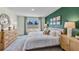 Comfortable bedroom with a plush bed, soft gray carpet and stylish wood dresser at 3327 Thistle Bank Ct, Plant City, FL 33565