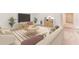 Comfortable living room featuring stylish furniture, a large TV, and plenty of natural light at 3529 Thistle Bank Ct, Plant City, FL 33565