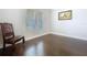 Cozy bedroom with hardwood floors, natural light, and neutral paint at 3643 Arbor Chase Dr, Palm Harbor, FL 34683