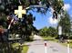 Picture of the Dunedin community trail and crossing, for walking, cycling, and enjoying the scenery at 3643 Arbor Chase Dr, Palm Harbor, FL 34683