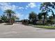 Arbor Chase gated community entrance, featuring well-maintained landscaping and signage at 3643 Arbor Chase Dr, Palm Harbor, FL 34683