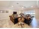 Inviting living room featuring a large sectional sofa and plenty of natural light at 3643 Arbor Chase Dr, Palm Harbor, FL 34683