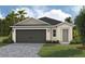 Charming single-Gathering home with a well-manicured lawn and a two-car garage at 37155 Sagemoor Dr, Zephyrhills, FL 33541