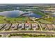 Gorgeous aerial view of home situated on a golf course with tranquil lakes at 3888 Santa Caterina Blvd, Bradenton, FL 34211