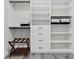 Customized closet with drawers, shelves, and hanging rods providing ample storage space at 3888 Santa Caterina Blvd, Bradenton, FL 34211
