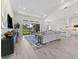 Bright and open living space with golf course view, sleek flooring, and stylish decor at 3888 Santa Caterina Blvd, Bradenton, FL 34211
