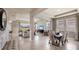 Spacious living area with stylish furniture, large windows, and modern decor at 4027 Harvest Hearth Pl, Plant City, FL 33565