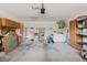 Garage with included washer/dryer, work bench, and storage shelves at 4032 Salem Square Ct, Palm Harbor, FL 34685