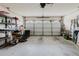 Spacious two car garage with storage, and overhead door at 4032 Salem Square Ct, Palm Harbor, FL 34685