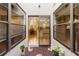 Enclosed patio with sliding doors offering a view of the dining room and kitchen at 4032 Salem Square Ct, Palm Harbor, FL 34685