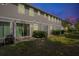 Exterior view of back of property featuring a cozy outdoor space with a private, fenced-in backyard at 4316 Sailplane Ct, Wesley Chapel, FL 33545