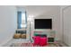 Spare bedroom offers a work space and a reading nook by the window at 4316 Sailplane Ct, Wesley Chapel, FL 33545
