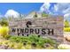 Attractive stone entrance sign for Wyndrush Creek, a beautiful and well-maintained community at 4316 Sailplane Ct, Wesley Chapel, FL 33545